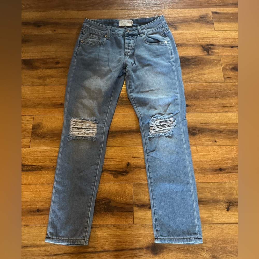Women's Distressed Blue Jeans. 24 in waist